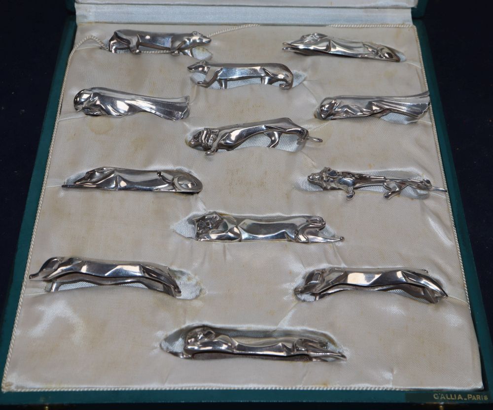 A cased set of twelve Gallia for Christofle Art Deco silver plated knife rests designed by Edouard Marcel Sandoz
